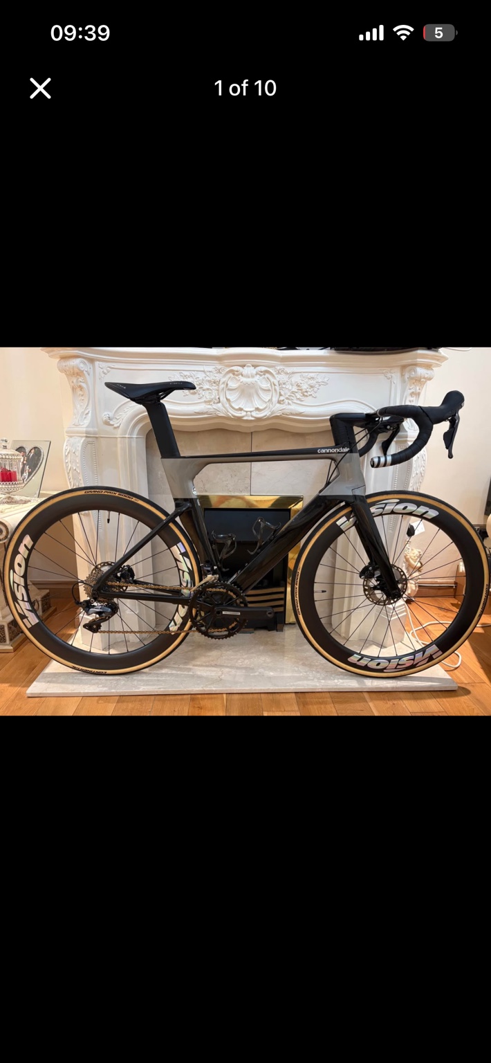 Grey and black Cannondale SystemSix road bike with Vision carbon wheels, drive-side view