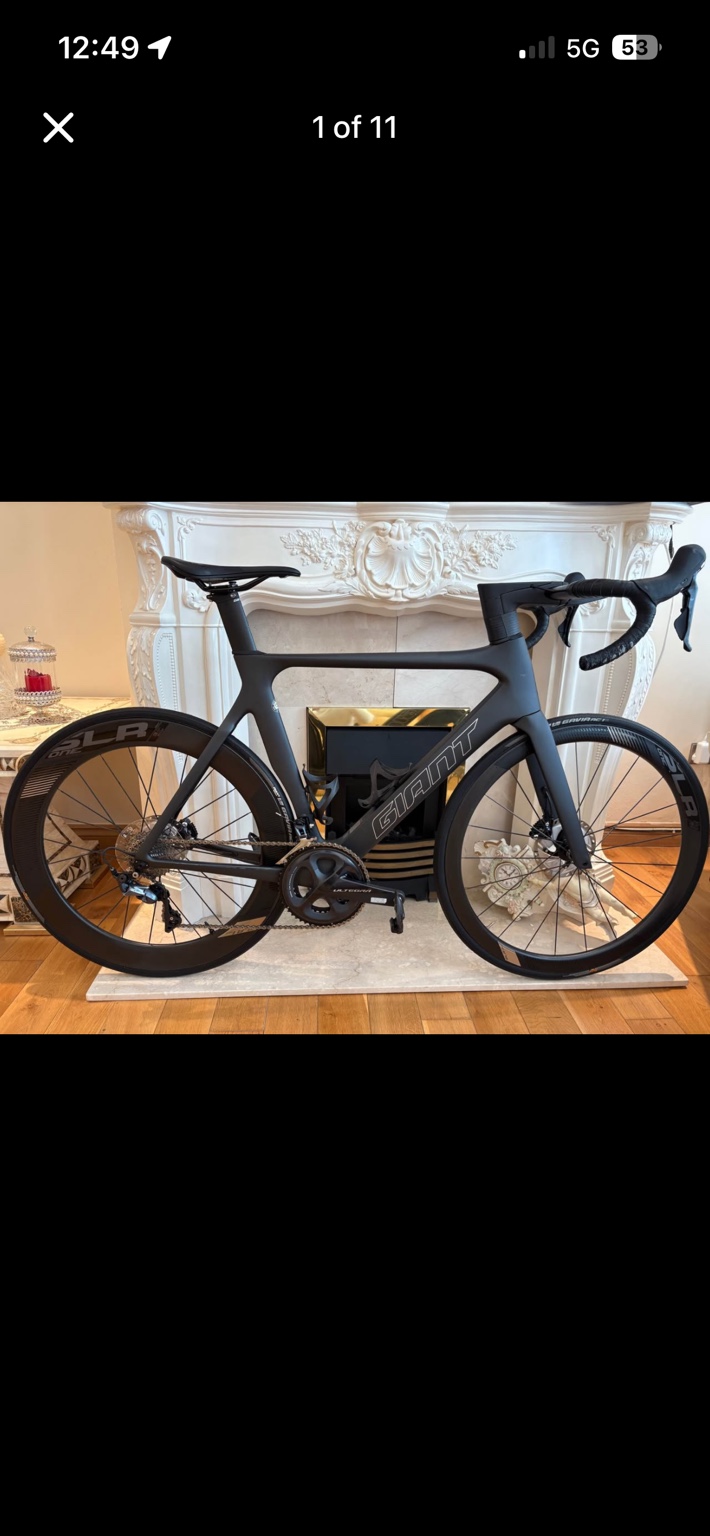 Black Giant Propel Advanced Pro 1 Disc road bike with SLR carbon wheels, drive-side view