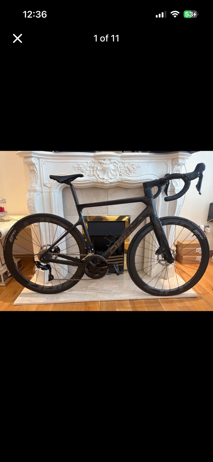 Black Orbea Orca M30 carbon road bike with Zipp wheels, drive-side view