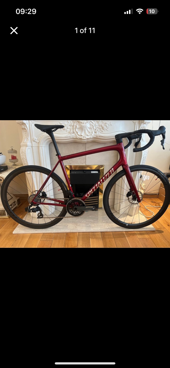 Red Specialized Aethos 2 road bike, drive-side view