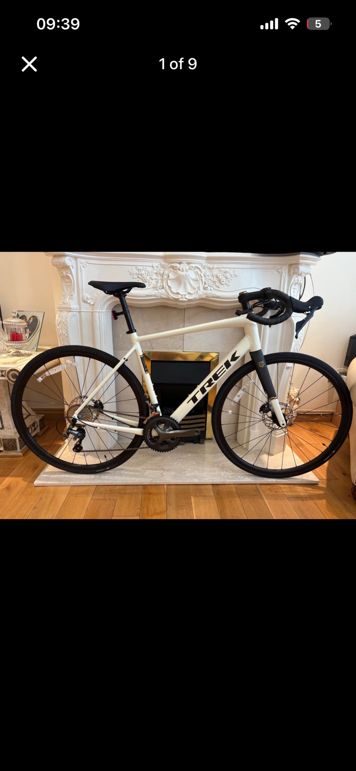 Era White Trek Domane AL 4 road bike, drive-side view