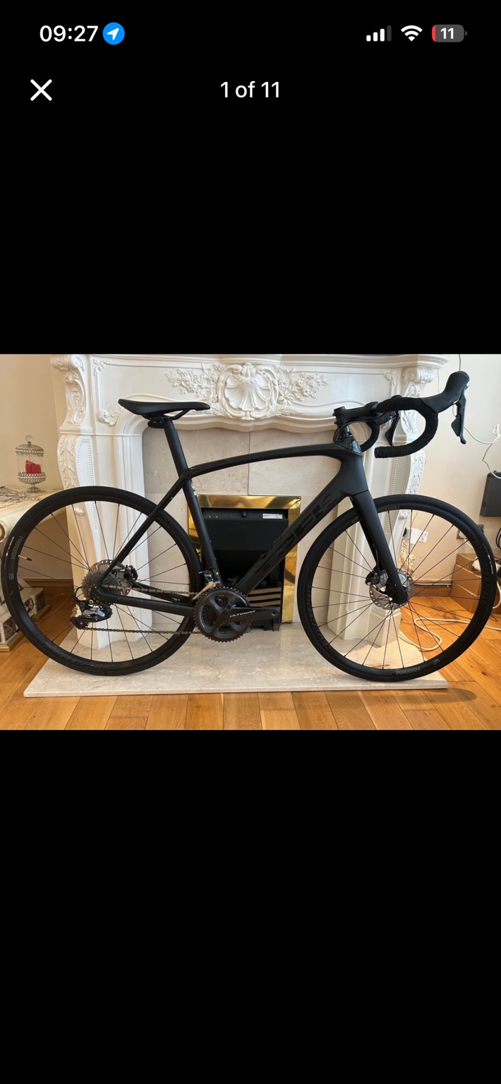 Black Trek Domane SL 6 Gen 3 road bike, drive-side view