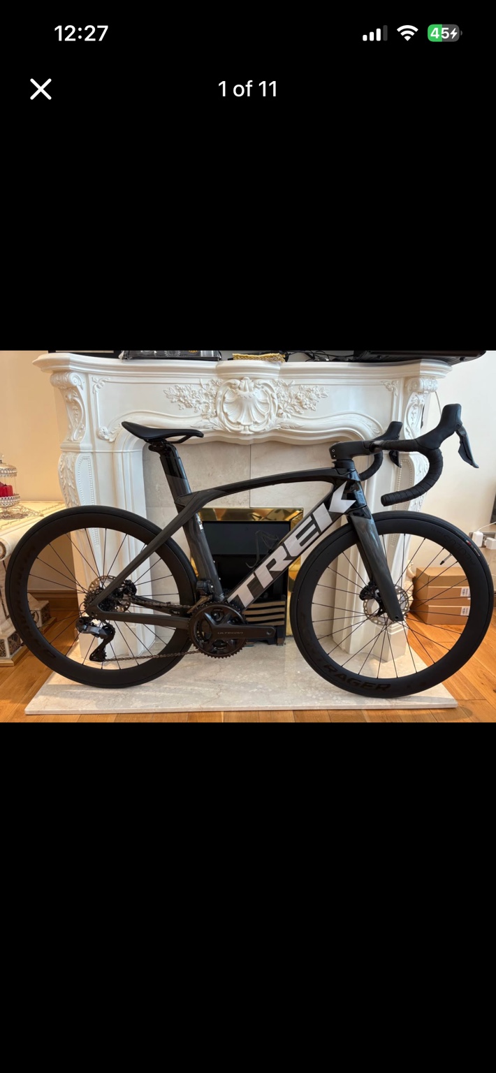 Black Trek Madone SL 7 Gen 6 aero road bike, drive-side view