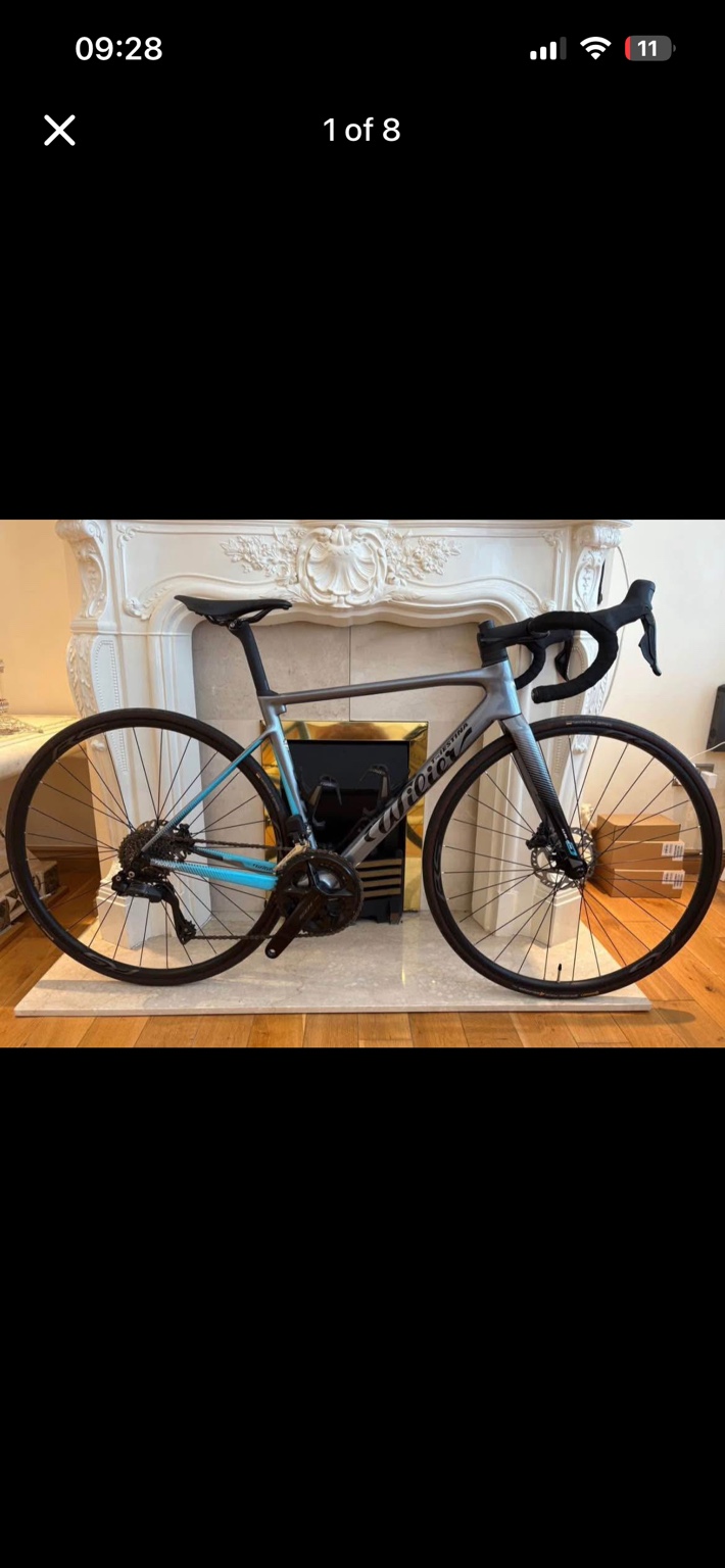 Grey and light blue Wilier Triestina 0 SL road bike, drive-side view